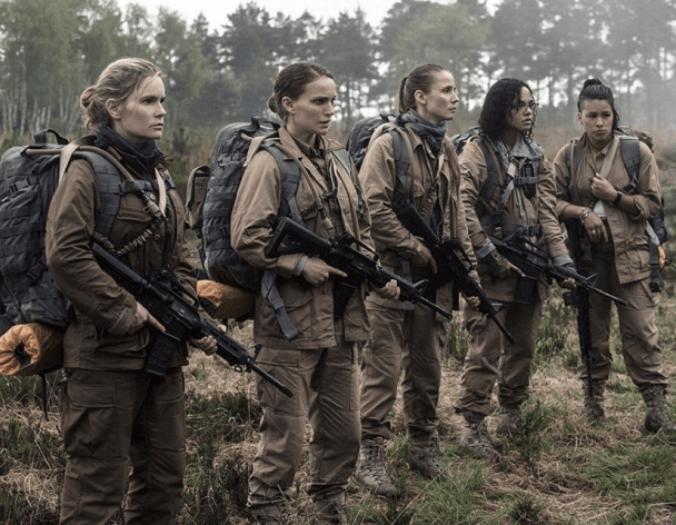 The 5 main characters from Annihilation standing in military gear, all female.