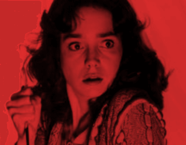 Stylized frame from the original Suspirira film of the main character holding a knife